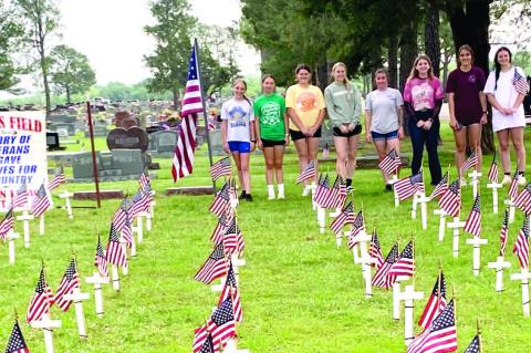 MOSS CHEERLEADERS HONORED FALLEN SOLDIERS AT HOLDENVILLE CEMETERY THIS PAST MEMORIAL DAY.